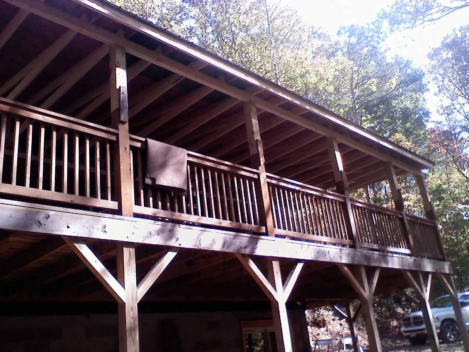 Timber framing under a new elevated porch and deck — Roof Leak Repair in Sandisfield by Roofing Brothers